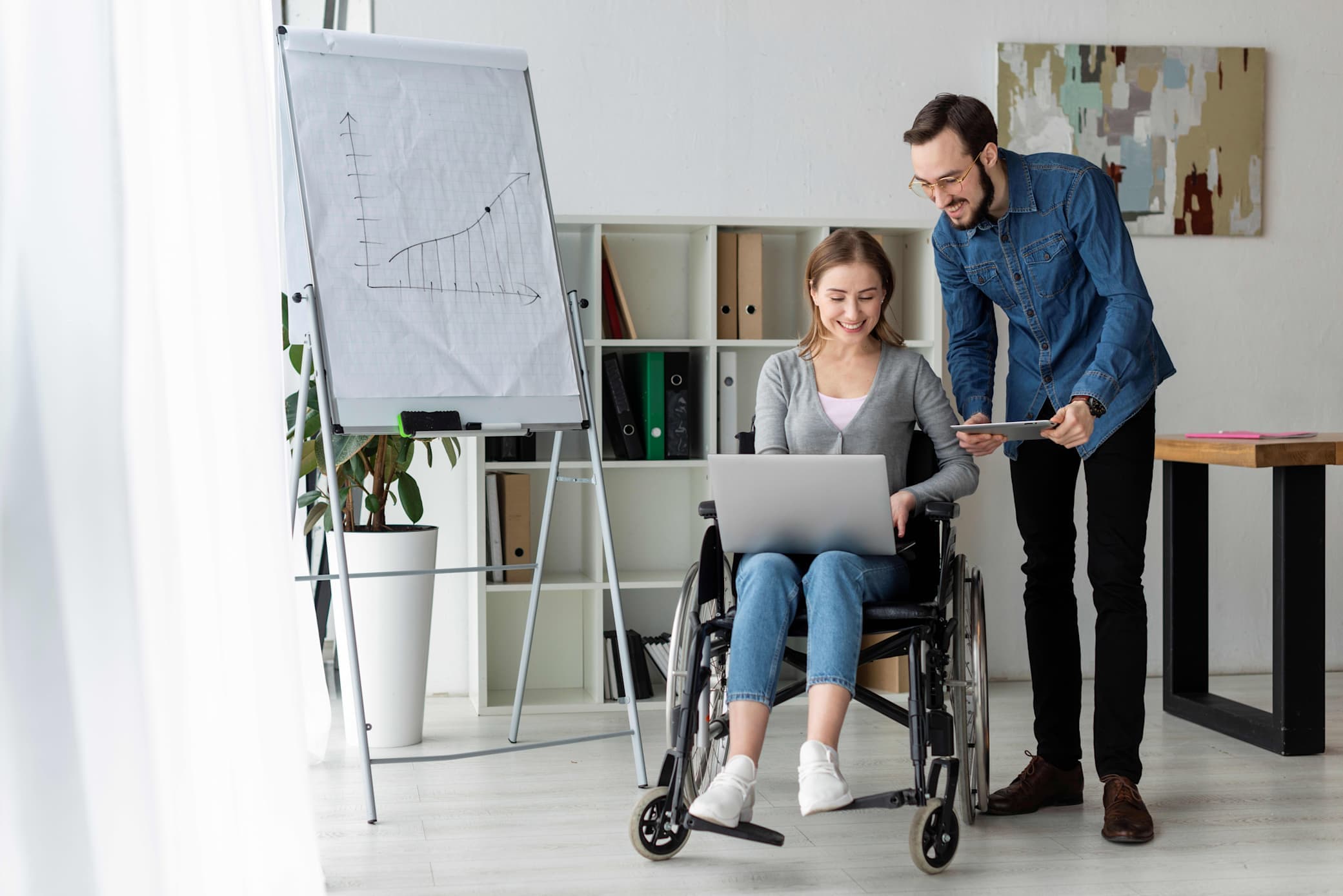 People reviewing accessible public service materials together